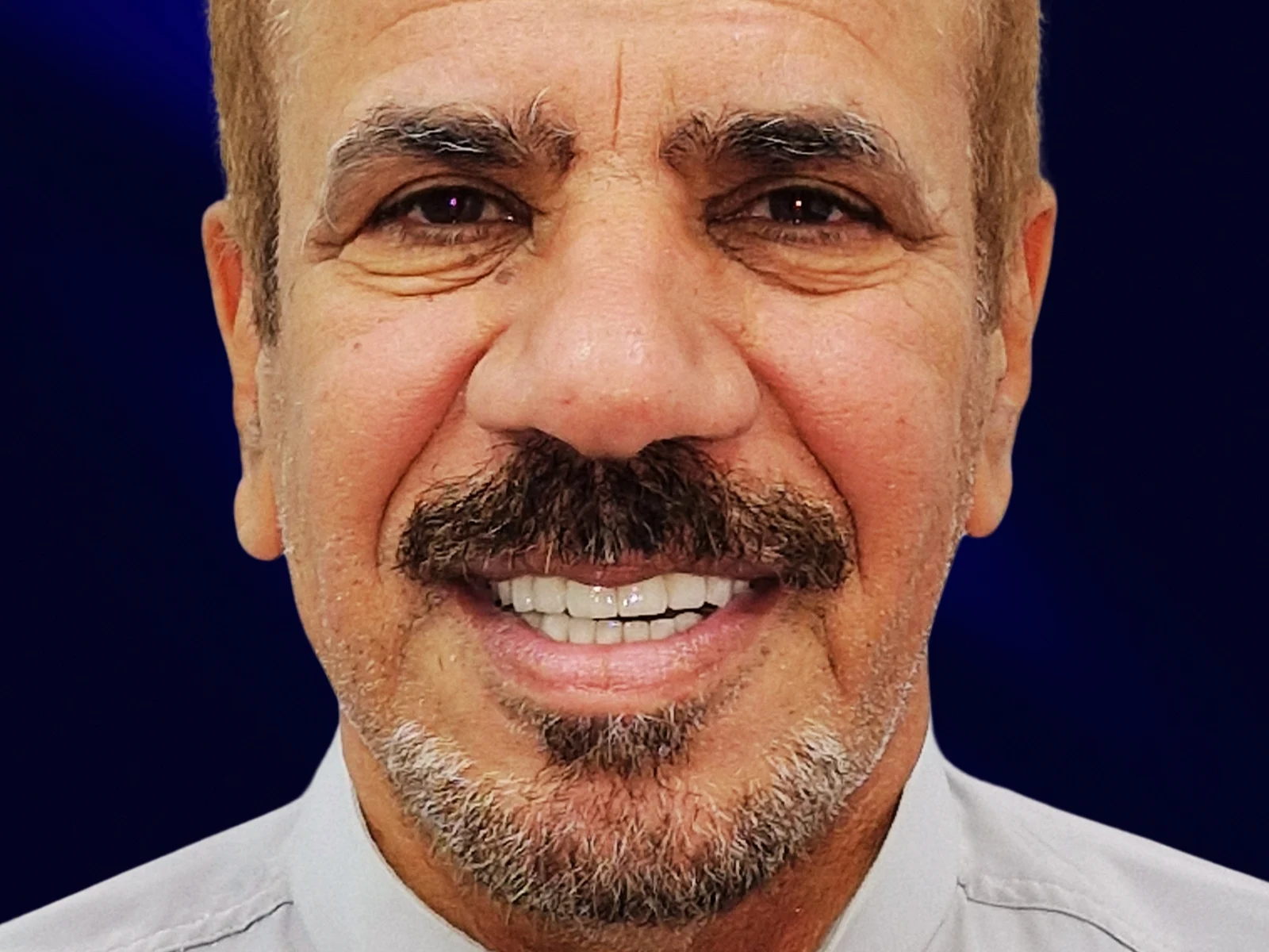 Patient smile after full mouth dental implants at HaiDent Nariman Point Mumbai — international patient result